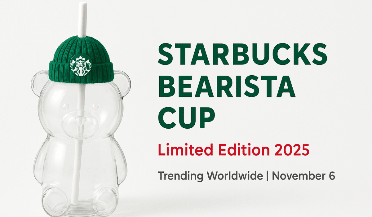 Teddy bear shaped Starbucks cup with green beanie cap and white straw on holiday display